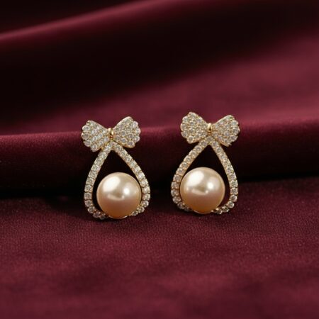 The Glimmering Pearl Bow Studs